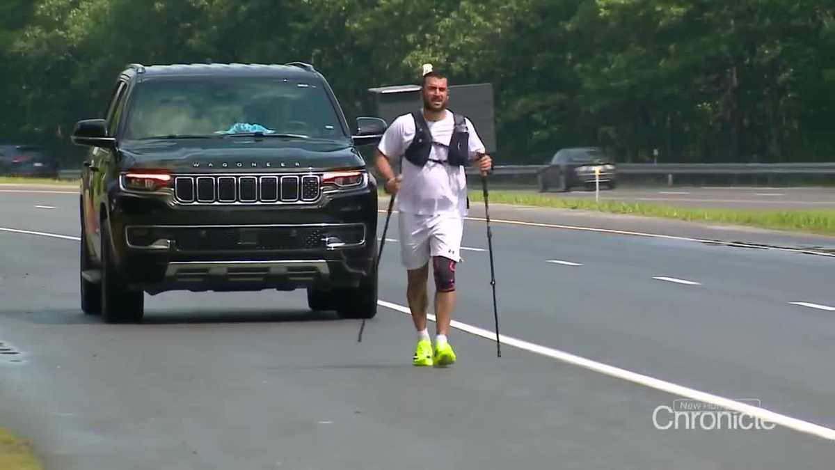 Man, previously bedridden for 2 years, completes record-setting run across length of New Hampshire