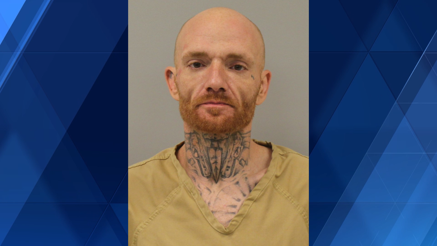 8-hour standoff ends with arrest of man wanted on robbery charges