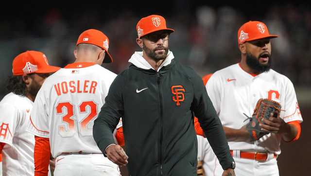 San Francisco Giants manager won't stand for anthem following mass