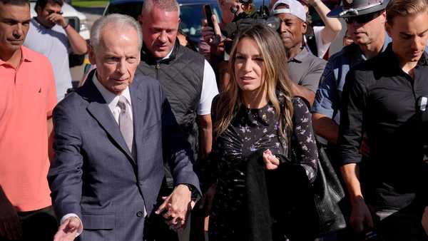 karen read, center right, arrives at norfolk superior court with her father william read, center left, tuesday, june 25, 2024, in dedham, mass. karen read is on trial, accused of killing her boyfriend boston police officer john o'keefe, in 2022. (ap photo/steven senne)