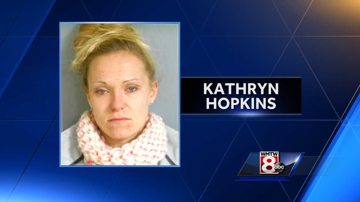 Woman found passed out in car with needle in arm, child also in car