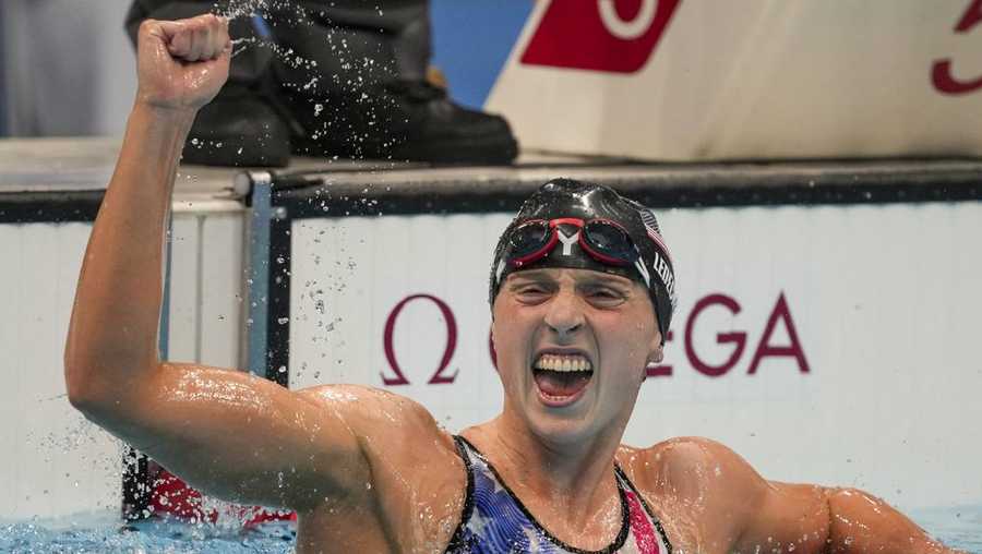 FILE - Katie Ledecky reacts after winning the women's 1500-meters freestyle final at the 2020 Summer Olympics in Tokyo, in this Wednesday, July 28, 2021, file photo. Ledecky announced Wednesday, Sept. 22, 2021, that she is moving to the University of Florida to be closer to home and train under Anthony Nesty, a rising star coach who will oversee her preparations for the 2024 Paris Olympics. Ledecky, a seven-time Olympic gold medalist, spent the last five years at Stanford University, where she worked with U.S. national team coach Greg Meehan while earning a psychology degree. (AP Photo/Matthias Schrader, File)