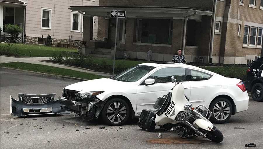 KCK motorcycle officer suffers minor injuries in crash with car