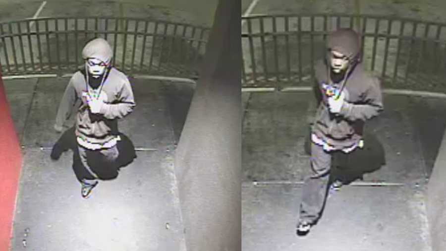 Suspect wanted in possibly armed business robbery