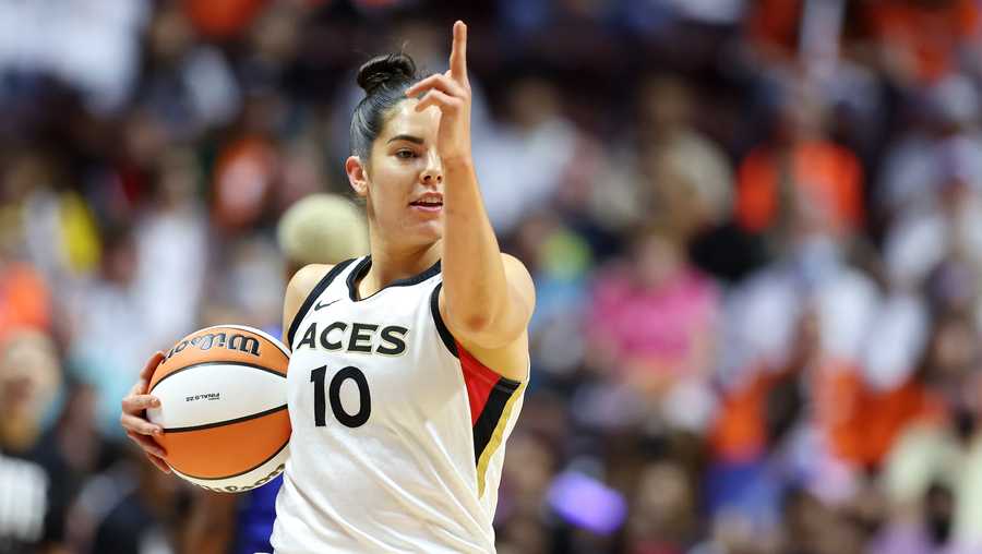 UNCASVILLE, CONNECTICUT - SEPTEMBER 18: Kelsey Plum #10 of the Las Vegas Aces celebrates in the first half against the Connecticut Sun during game four of the 2022 WNBA Finals at Mohegan Sun Arena on September 18, 2022 in Uncasville, Connecticut. NOTE TO USER: User expressly acknowledges and agrees that, by downloading and or using this photograph, User is consenting to the terms and conditions of the Getty Images License Agreement.  (Photo by Maddie Meyer/Getty Images)