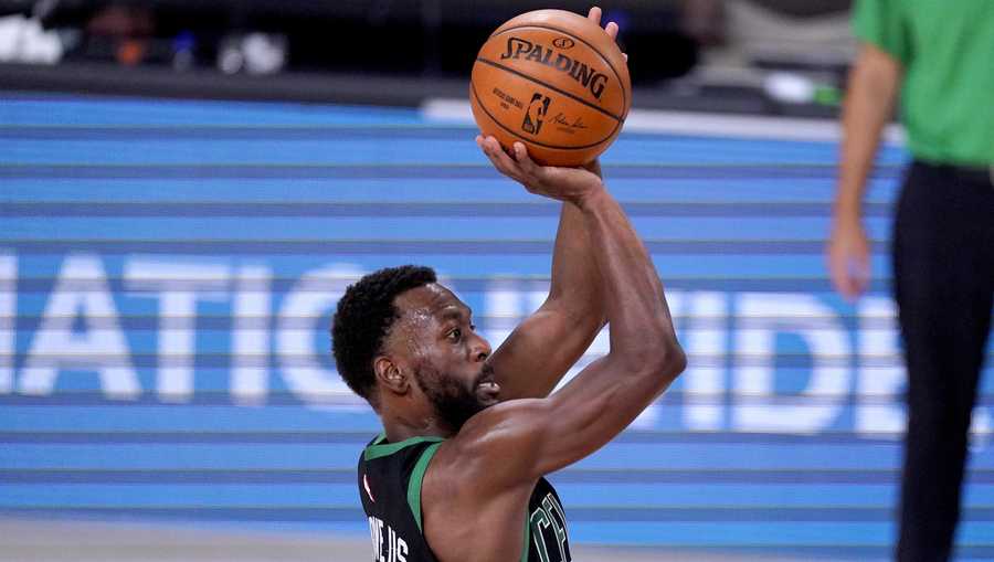 Boston Celtics' Kemba Walker shoots against the Toronto Raptors during the second half of an NBA conference semifinal playoff basketball game Friday, Sept. 11, 2020, in Lake Buena Vista, Fla. (AP Photo/Mark J. Terrill)