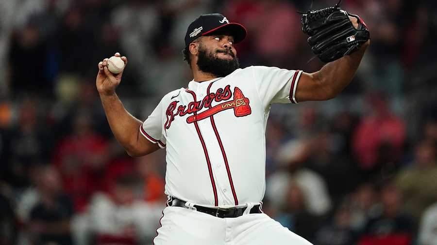 Atlanta Braves relief pitcher Kenley Jansen (74) works during the ninth inning in Game 2 of baseball's National League Division Series between the Atlanta Braves and the Philadelphia Phillies, Wednesday, Oct. 12, 2022, in Atlanta.=