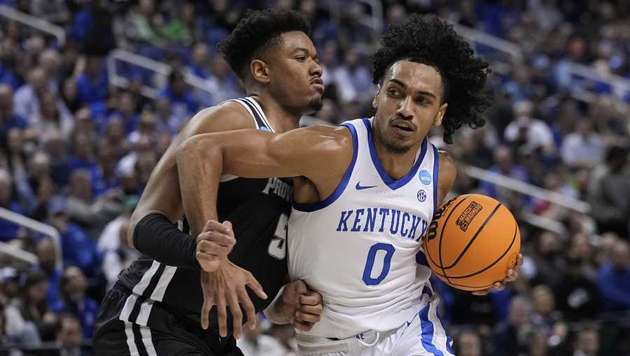 Jacob Toppin,Ed Croswell Kentucky forward Jacob Toppin (0) drives against Providence forward Ed Croswell (5)during the first half of a first-round college basketball game in the NCAA Tournament on Friday, March 17, 2023, in Greensboro, N.C.