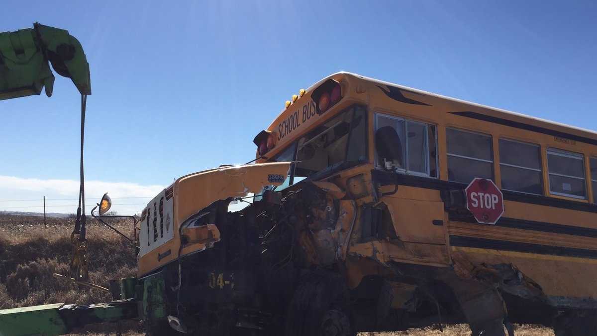 Teen charged in crash with school bus