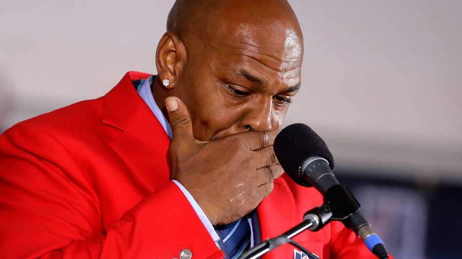 In this file photo, former NFL football running back Kevin Faulk is tearful while speaking as he is inducted into the New England Patriots Hall of Fame during ceremonies at Gillette Stadium, Monday, Aug. 1, 2016, in Foxborough, Mass. (AP Photo)