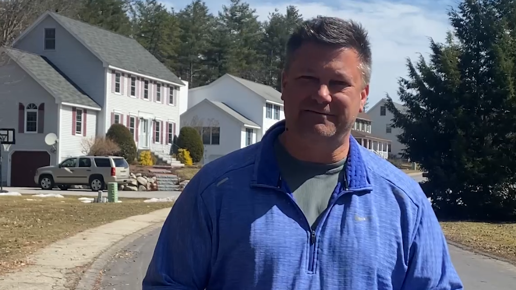 WMUR's Kevin Skarupa receives his Boston Marathon bib number