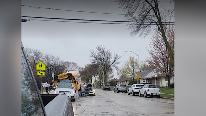 Multi-vehicle crash including Kia, school bus, leaves 2 injured