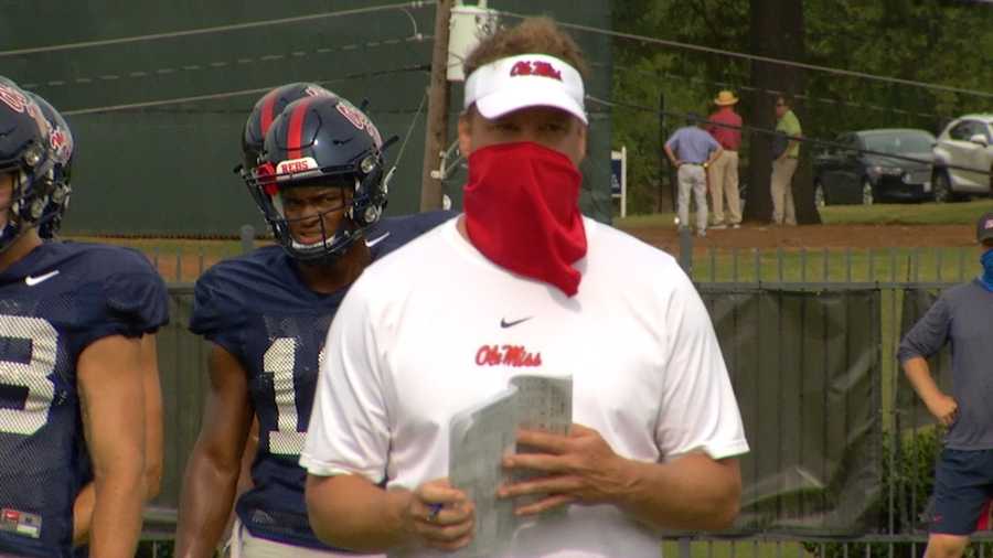 Rebels coach Lane Kiffin looks on at practice