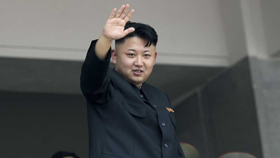 In this July 27, 2013, file photo, North Korea's leader Kim Jong Un waves to spectators and participants during a mass military parade celebrating the 60th anniversary of the Korean War armistice in Pyongyang, North Korea. 