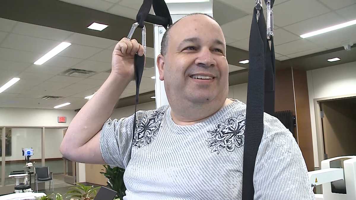 Paralyzed man takes steps with help of robotics