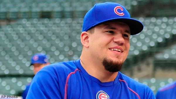 Chicago Cubs catcher and designated hitter KYLE SCHWARBER hits a single