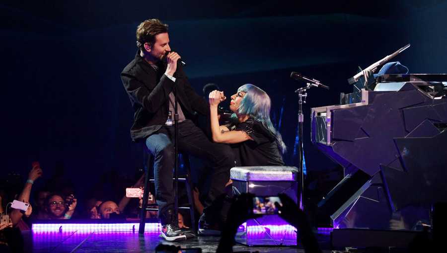 Lady Gaga (R) performs "Shallow" with actor/director Bradley Cooper (L) during her ENIGMA residency at Park Theater at Park MGM on Jan. 26 in Las Vegas.