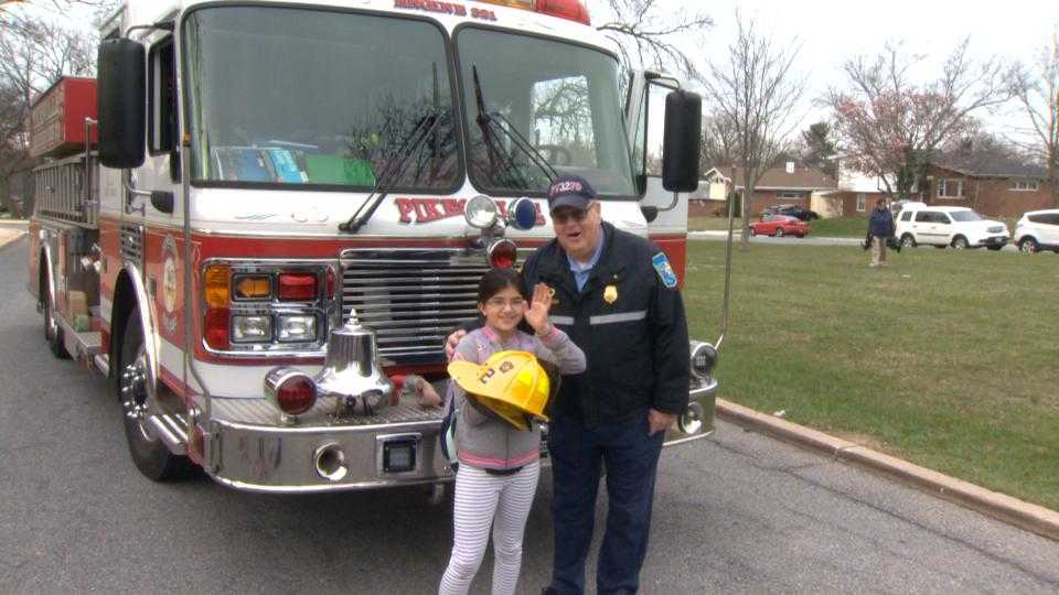 Girl gets unforgettable ride to school on fire truck