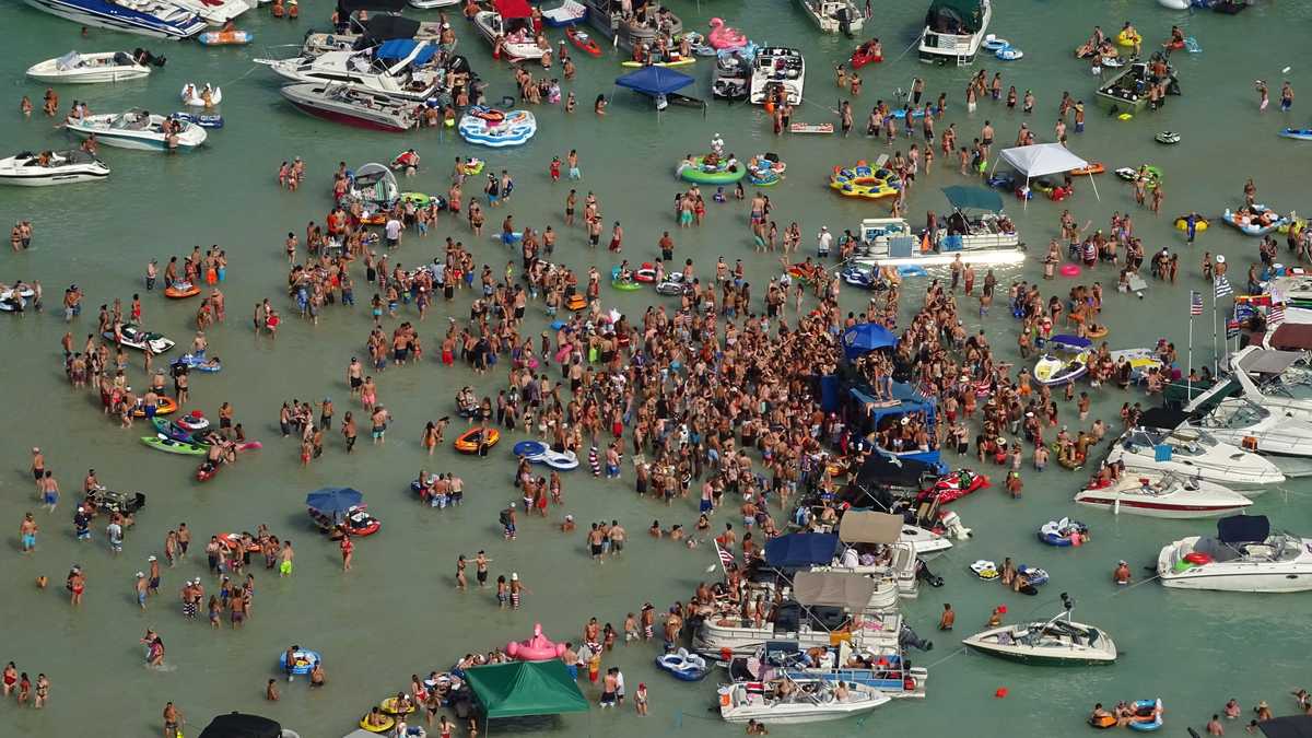Hundreds of people celebrated the July 4 weekend at a Michigan lake