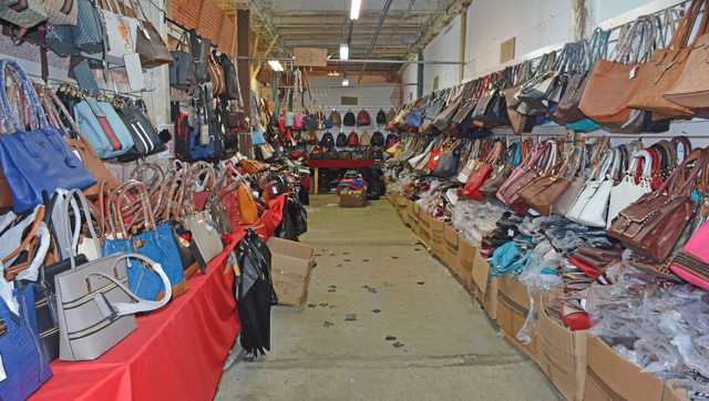 Counterfeit designer goods seized at Macomb flea market