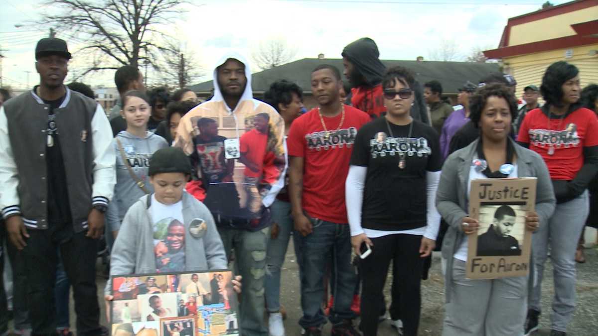 IMAGES: Family, friends march for justice year after homicide