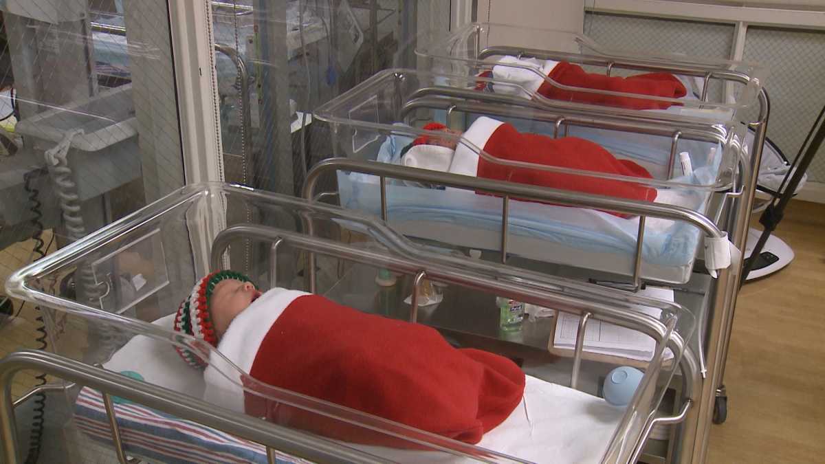 Hospital holiday tradition: newborns wrapped in Christmas stockings