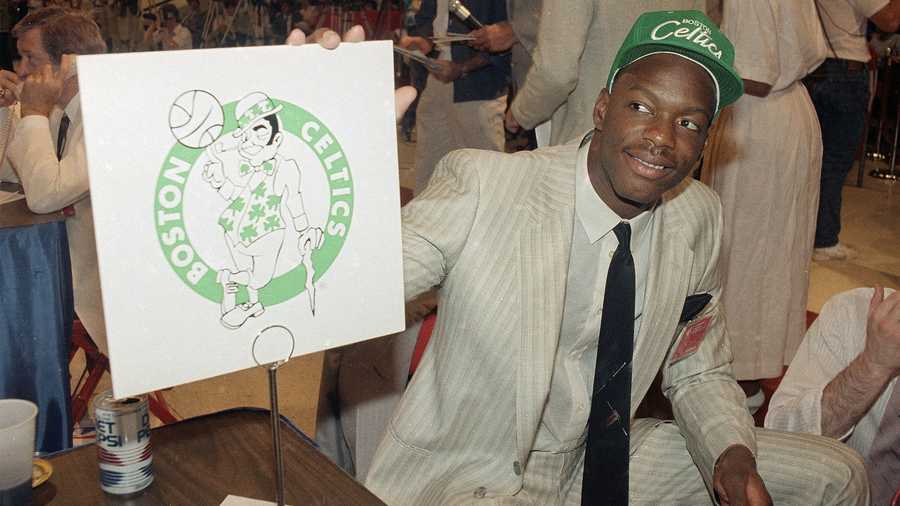 Boston Celtics draft pick Len Bias is shown at the Celtics draft table in New York in this file photo from June 17, 1986. Two days after being selected by the Boston Celtics as the No.2 pick in the 1986 NBA draft Bias died of cocaine intoxication. (AP Photo/files)