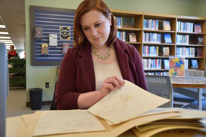 Archivist Kelley Sirko looks at love letters between a Black soldier and his wife during World War II that are part of a digital exhibit on Monday, Feb. 9, 2026 in Nashville, Tenn.