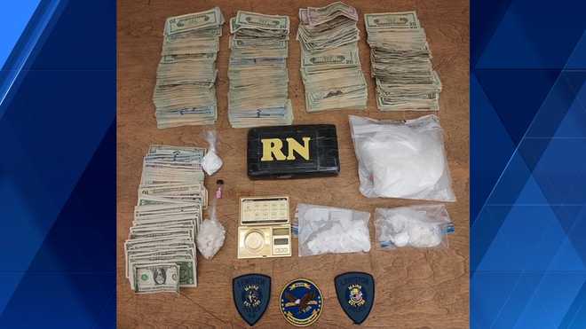 The Maine Drug Enforcement Agency says it seized nearly two kilograms of cocaine, trafficking materials and more than $25,000 in suspected drug proceeds during a probation compliance check and subsequent search of a home in Lewiston, Maine, on Nov. 26, 2024.