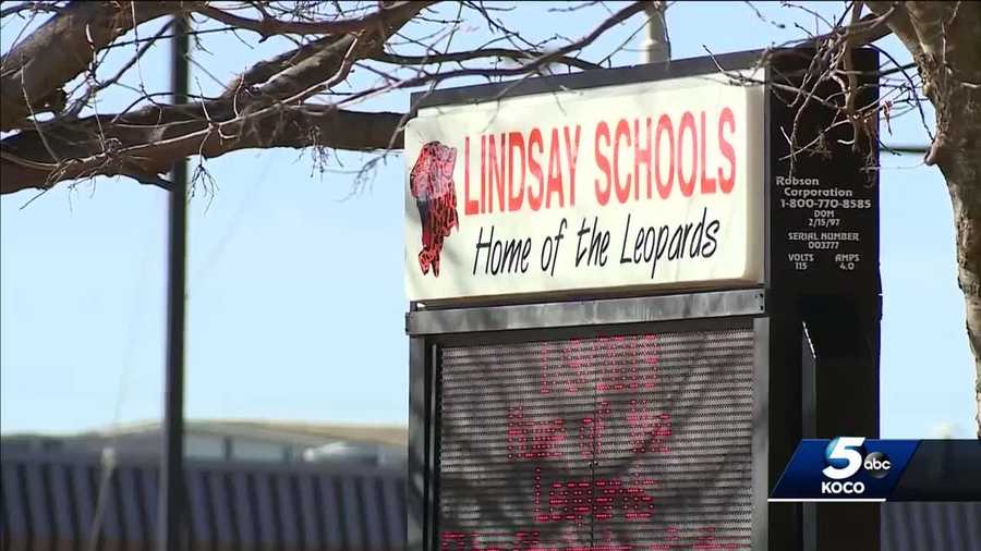 A threatening note found written on a bathroom wall at Lindsay Elementary School prompted officials to call police and cancel classes early Monday, according to officials with the school district.