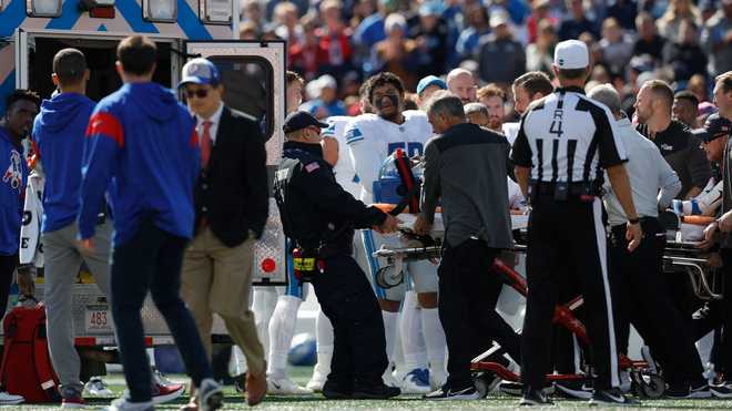 Lions player placed on backboard, taken off field in ambulance