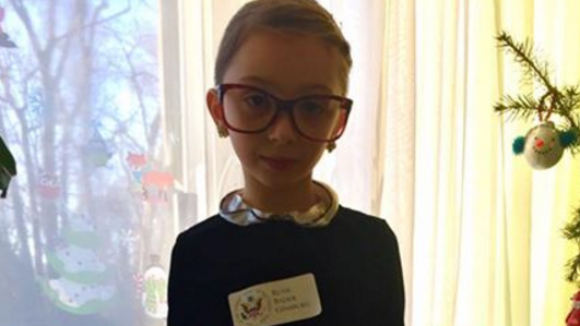 Little girl dressed as Ruth Bader Ginsburg