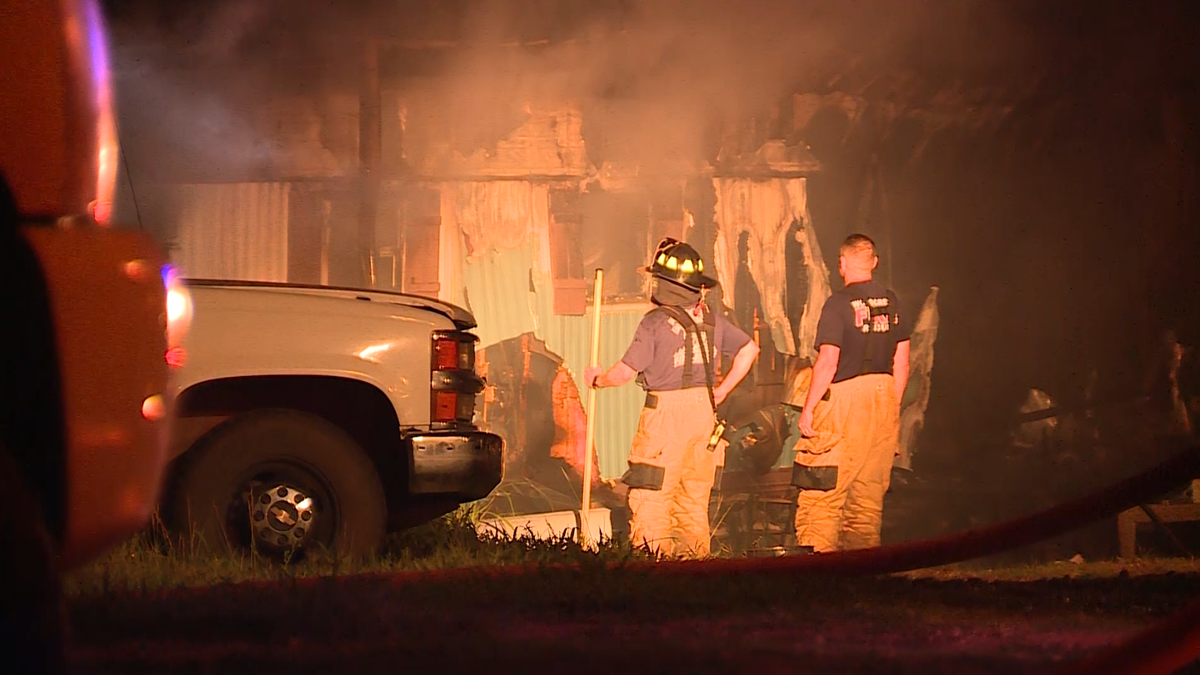 Person taken to hospital after Logan County home catches fire