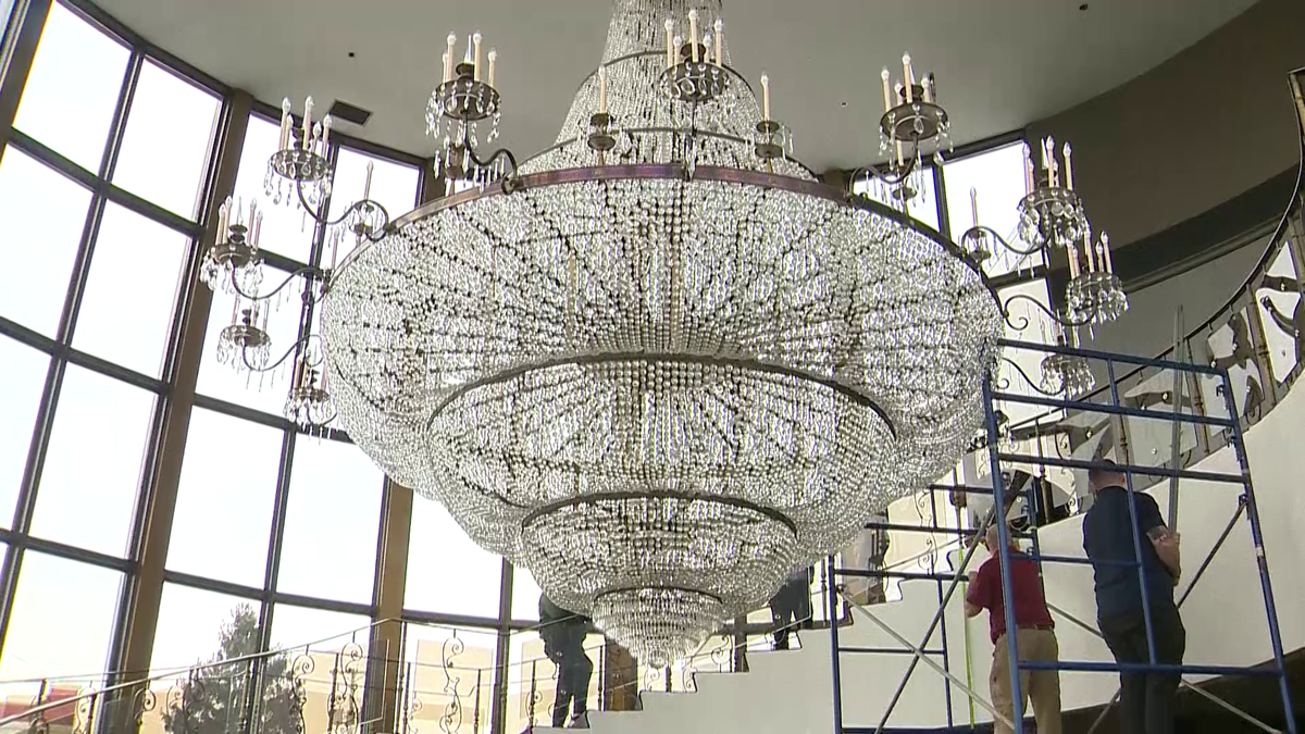 Wedding venue’s enormous chandelier undergoes spring cleaning