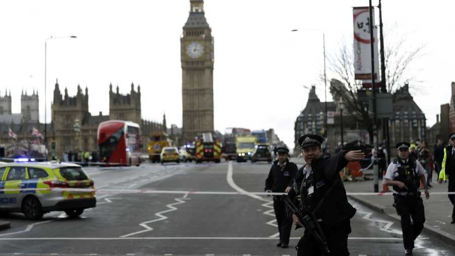 Police secure the area on the south side of Westminster Bridge close to the Houses of Parliament in London, Wednesday, March 22, 2017. The leader of Britain's House of Commons says a man has been shot by police at Parliament. David Liddington also said there were "reports of further violent incidents in the vicinity." London's police said officers had been called to a firearms incident on Westminster Bridge, near the parliament. Britain's MI5 says it is too early to say if the incident is terror-related.