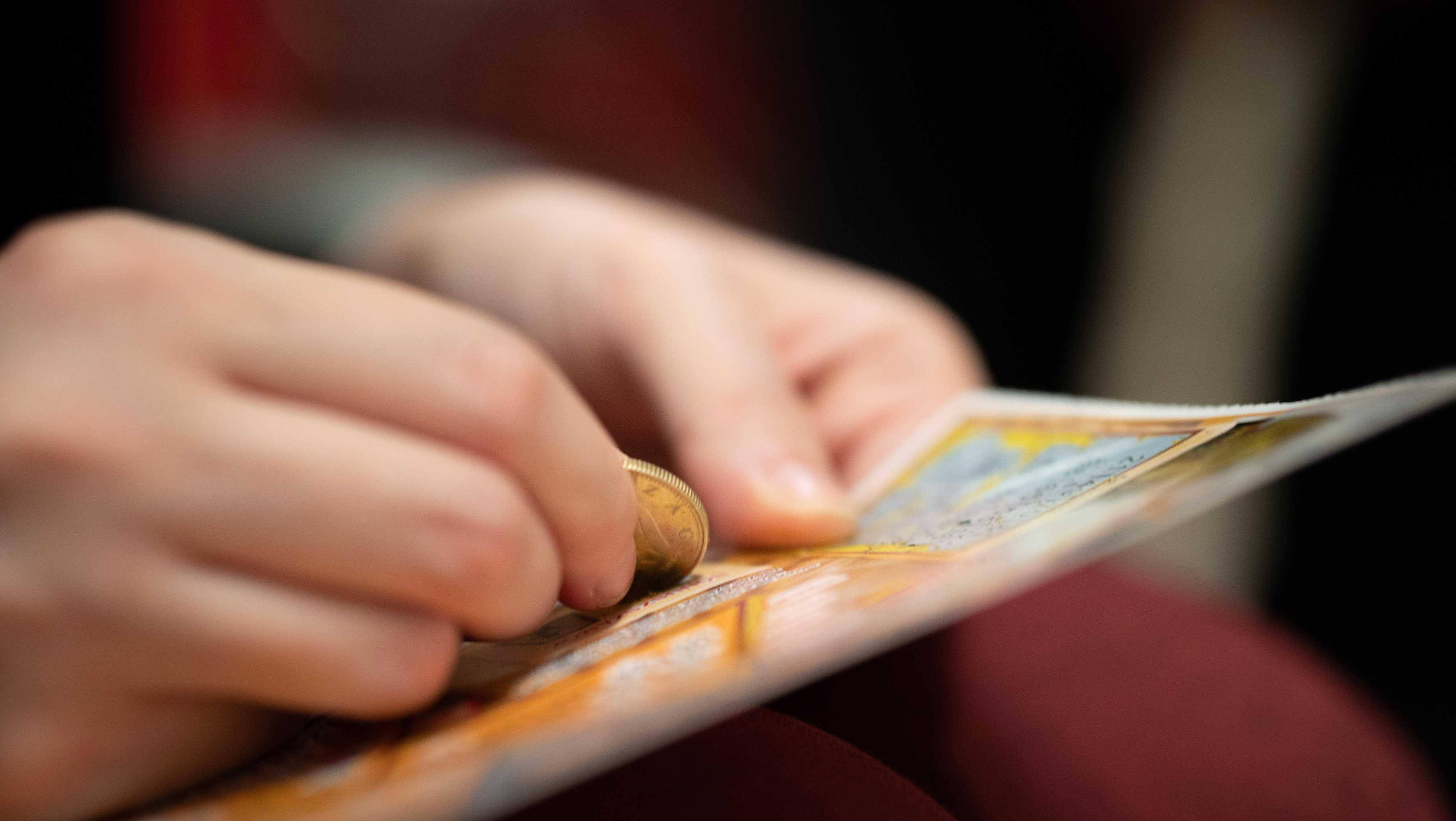 Michigan woman wins $2 million on scratch off during pizza run - Vimarsana News