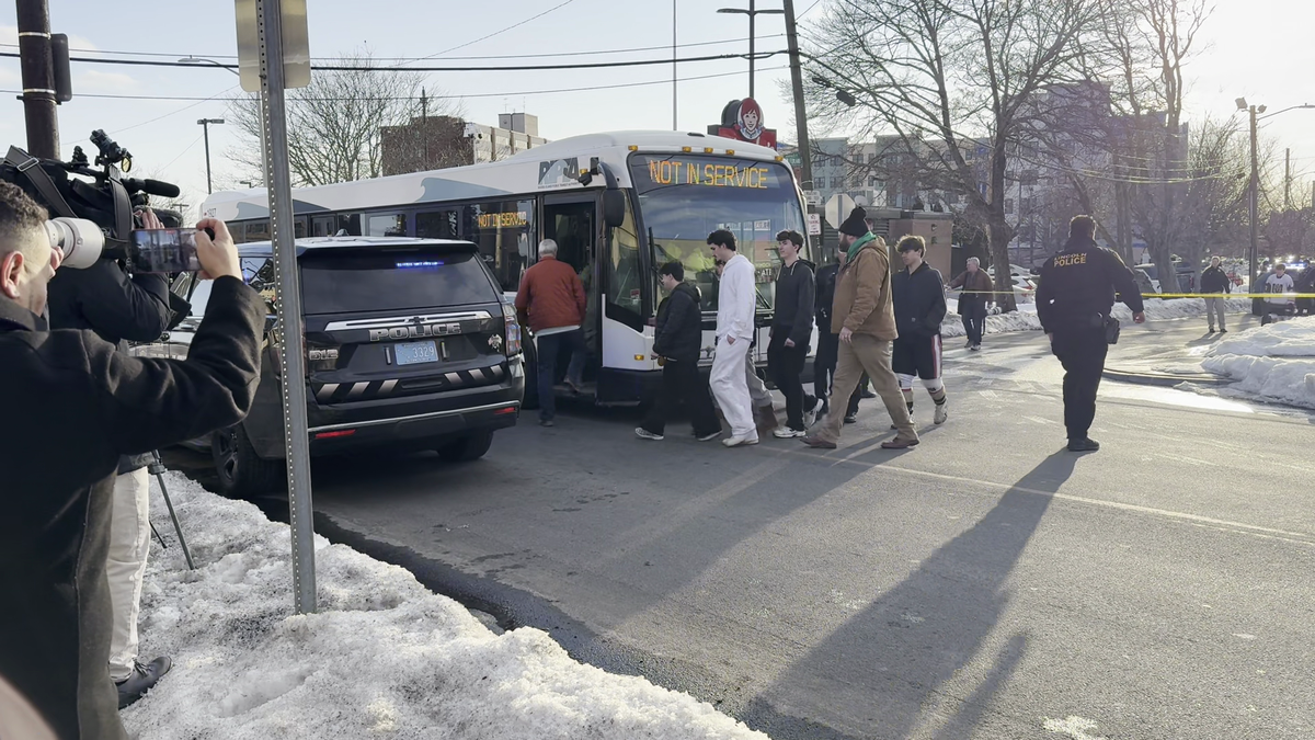 Hockey players, families bused away from arena after deadly shooting