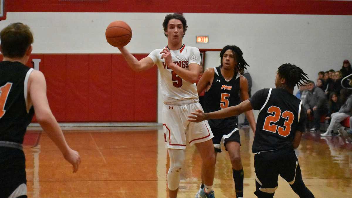 Moriah High School and Ticonderoga High School boys basketball grab