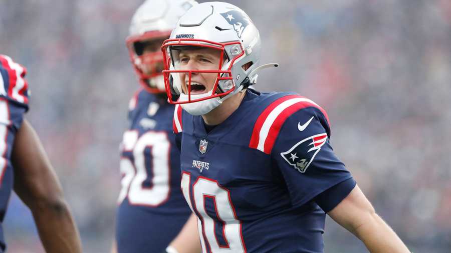 New England Patriots quarterback Mac Jones (10) celebrates after a touchdown pass to wide receiver Kristian Wilkerson during the first half of an NFL football game against the Jacksonville Jaguars, Sunday, Jan. 2, 2022, in Foxborough, Mass. (AP Photo)