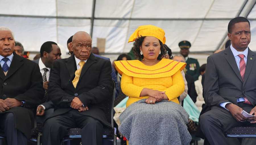 Newly appointed Lesotho prime Minister Thomas Thabane (L), leader of the All Basotho Convention (ABC) political party, his wife Maesaiah Thabane and Zambian President Edgar Lungu (R) attend Thabane's inauguration on June 16, 2017 in Maseru. 
