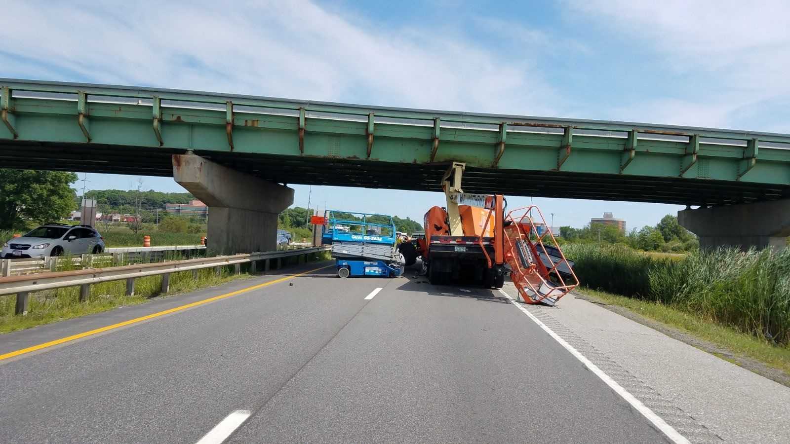 Truck Hauling Equipment Hits Maine Turnpike Overpass, Driver Seriously ...