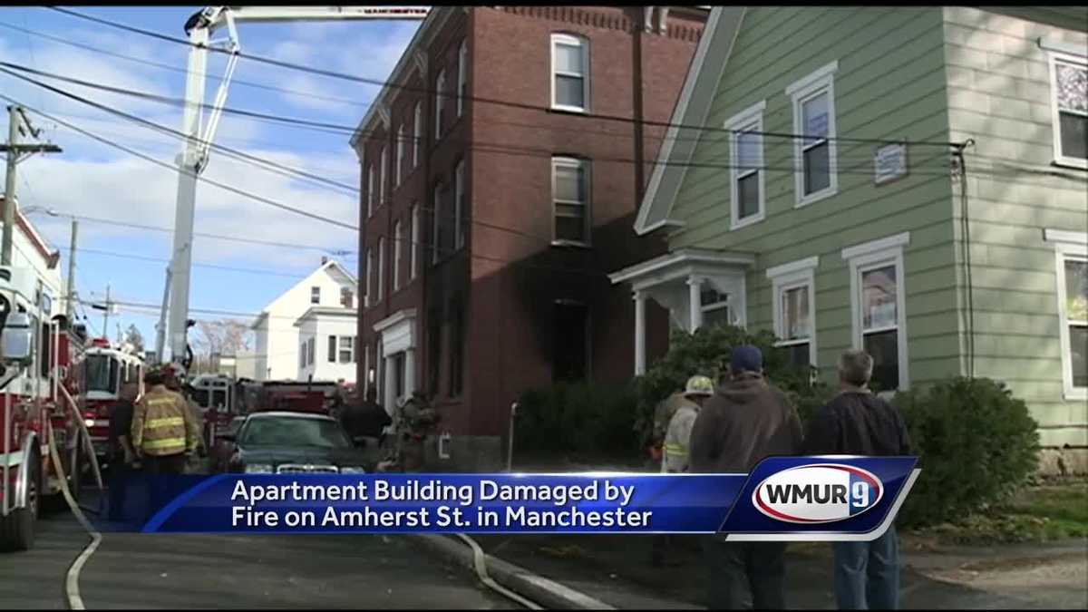 Fire burns in Manchester apartment building