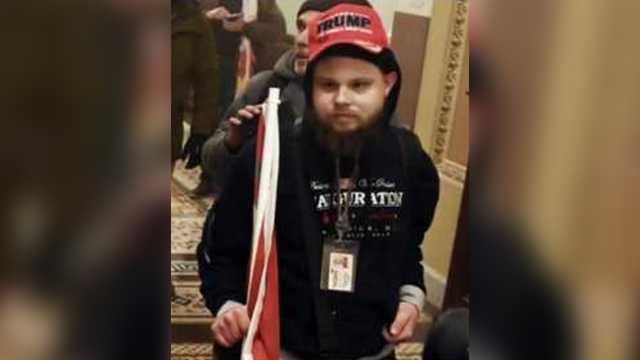 Man seen inside US Capitol during riots wearing work ID fired from job - Vimarsana News