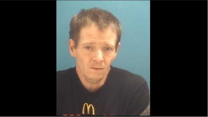 Machete-wielding man arrested after allegedly threatening people at gas ...