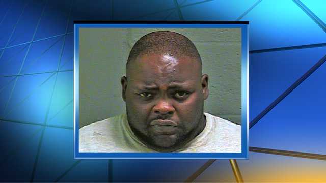 Man arrested in connection with shooting outside NW OKC home