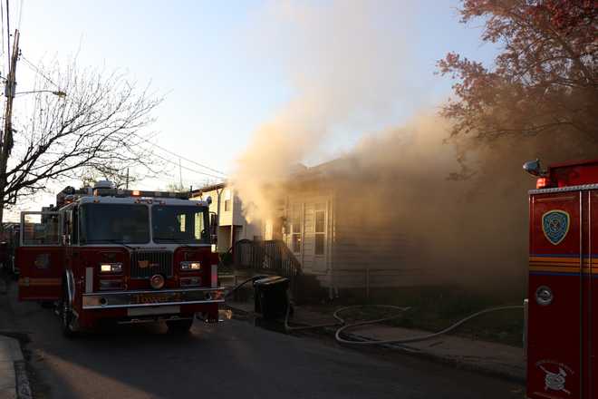 Woman in critical condition after house-fire rescue