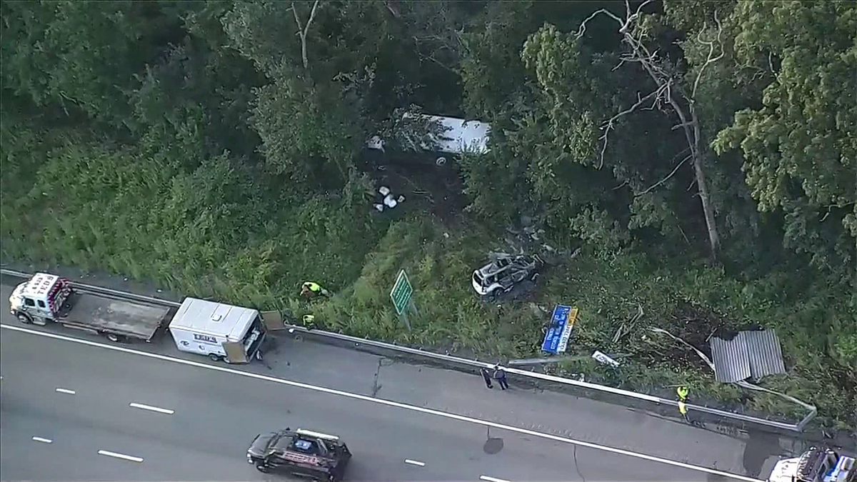 Two vehicles catch fire in crash on Mass Pike