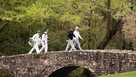 Rory McIlroy of Northern Ireland (R) and Patrick Reed of the US walk across a bridge during a practice round for the Masters tournament at the Augusta National Golf Club Augusta, Georgia, on April 8, 2014 Rory McIlroy of Northern Ireland (R) and Patrick Reed of the US walk across a bridge during a practice round for the Masters tournament at the Augusta National Golf Club Augusta, Georgia, on April 8, 2014