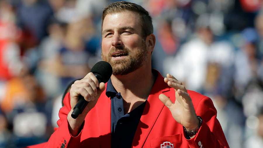 In this file photo, former New England Patriots tackle Matt Light speaks after being inducted into the Patriots Hall of Fame, during halftime of an NFL football game between the England Patriots and the Miami Dolphins, Sunday, Sept. 30, 2018, in Foxborough, Mass.