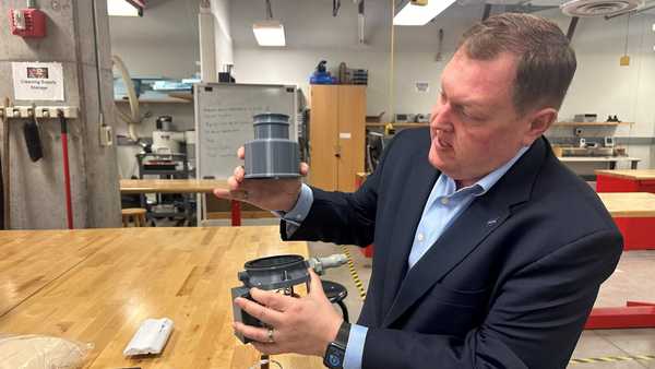 Iowa State University assistant professor Matthew Nelson explains the workings of high-altitude balloon equipment on April 4, 2024.